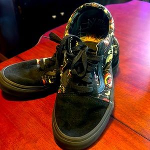 Vans Halloween style shoe with skull bat wings and fangs